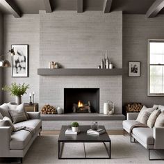 a living room filled with furniture and a fire place in the middle of the room