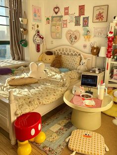 a bed room with a neatly made bed and lots of toys