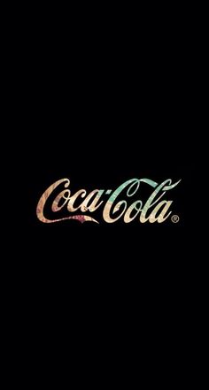 the coca cola logo is painted on a black background and it appears to be faded