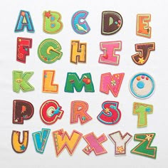 the letters and numbers are made out of patchwork material, which is very colorful