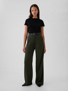 Soft woven trousers.  E-waist with concealed hook and bar closure, zip fly.  Front slant pockets, back welt pockets.  Pleating at front.  * Fit: Classic.  An easy silhouette that fits close  at the waist, and is relaxed through the hips and thigh.  Models wearing Gap Green Business Pants, Hip Business Casual, Business Casual For Nurses, Massage Therapist Outfits For Women, Women’s Work Wear, Green Slacks Outfit, Interview Clothes Women, Green Trouser Outfit Women, Dark Green Trousers Outfit