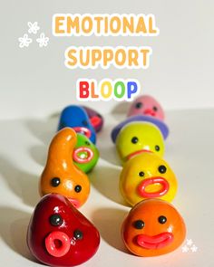 several colorful plastic toys with the words'emotion support bloop'written above them