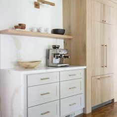 the kitchen is clean and ready to be used as a place for coffee or tea