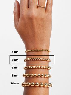 a woman's hand with four different bracelets on it and the measurements for each bracelet