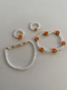 4 piece orange seed bead bracelet and ring set 2 bracelets 2 rings Bracelet And Ring Set, Funky Bracelet, Diy Beaded Rings, Crystal Bead Jewelry, Bracelet And Ring, Diy Bracelets Tutorials, Bracelet Craft Diy, Pola Gelang, Bracelets Design