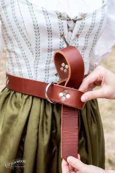 A good belt will elevate any costume, and this one is top of it's class. Hand crafted from the highest quality English bridle leather. Thick, durable, and built to last. It will start out a bit stiff, but quickly breaks in and learns your body without stretching out and compromising it's strength. All ring belts are UNISEX and come 60-65 inches long, but can be shortened. Let us know if you'd like a specific length in the "Order special instructions" section in your cart. If customized and cut, English Bridle, Ring Belt, Studded Belt, Eyeglass Case, Hair Barrettes, Pouch Bag, Purse Wallet, Stretching, Built To Last