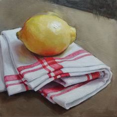 an oil painting of a lemon on top of two white and red striped napkins