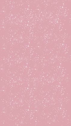 a pink background with white speckles