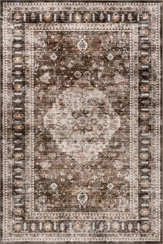 an area rug with brown and beige colors