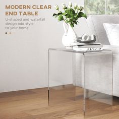 a modern clear end table with white flowers on it and the words modern clear end table