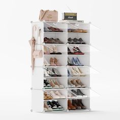 a white shoe rack filled with lots of shoes