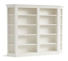 a white bookcase with two doors and shelves