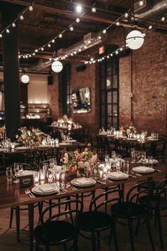 the tables are set with place settings for dinner