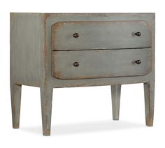 an old grey dresser with two drawers on one side and three knobs on the other