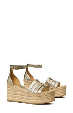 A dimensional Double-T logo stands out atop the strappy vamp of an espadrille-inspired sandal lifted by a jute-wrapped platform and wedge heel. 3" heel; 1 3/4" platform (size 8.5) Adjustable ankle strap with buckle closure Leather upper and lining/rubber sole Imported Gold Ankle Strap Wedge Sandals With Buckle Closure, Gold Wedge Sandals With Buckle Closure, Gold Wedge Sandals With Woven Sole, Gold Open Toe Platform Wedge Sandals, Gold Leather Wedge Sandals With 4-inch Heel, Rose Gold Accessories, Espadrilles Platform, Beautiful Sandals, Platform Wedge Sandals