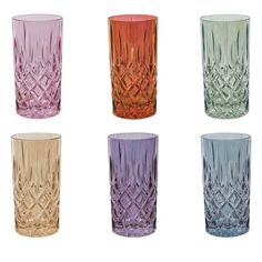 six different colored glass vases sitting next to each other