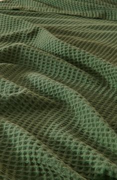 an image of a blanket that looks like it has wavy lines on it