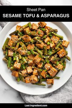 sesame tofu and asparagus served on a white plate with text overlay