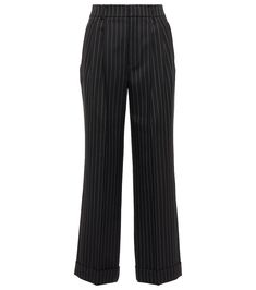 Saint Laurent's Parisian flair shines through designs like these effortlessly chic pinstripe pants | Saint Laurent High-rise pinstripe wool pants Black Pinstripe Pants, Classic Tailored Pinstripe Pants, Chic Pinstripe Wide-leg Pants, Luxury High-waisted Pinstripe Pants, Fitted Pinstripe Wide-leg Pants, Luxury Pinstripe Wide-leg Bottoms, Pinstripe Pants, Alice And Olivia, Pants Straight