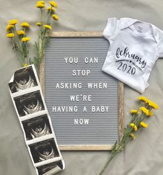 a baby announcement with yellow flowers and t - shirts next to the sign that says, you can stop asking when we're having a baby now