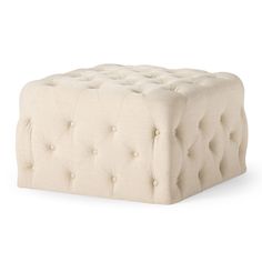 a white ottoman with buttons on the front and back legs, sitting against a white background