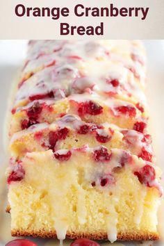 orange cranberry bread on a white plate