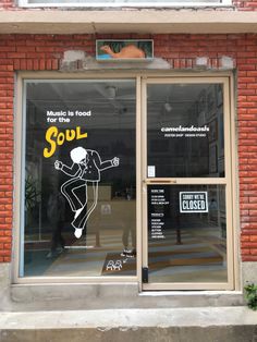 a store front window with an advertisement for soul