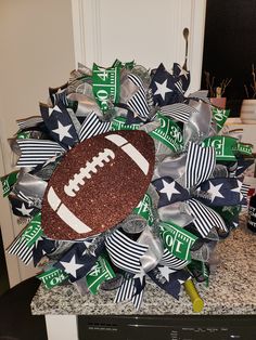 a football wreath on top of a granite counter