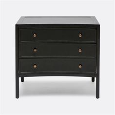 a black dresser with three drawers and brass knobs on the bottom, against a white background