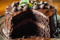 a chocolate cake is sitting on a plate