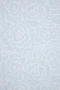 a blue and white wallpaper with an intricate design on it's surface,