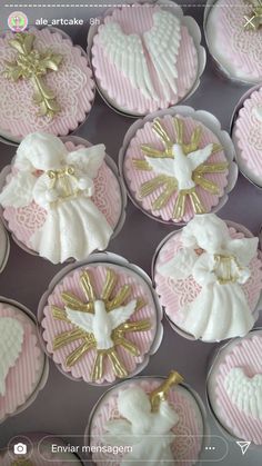 cupcakes decorated with white and pink icing