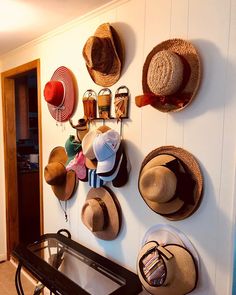 The Hat-Hanger is the perfect way to organize all of your hats on the wall and help them keep their original shape. Made from box board (think recycling), this quick and easy folding Hat Hanger can be hung within seconds thanks to it's high quality non-permanent adhesive tape. The non-permanent tape leaves no residue on your walls and doesn't peel off paint. The bend of the Hat Hanger keeps your hats in their original shape and doesn't stretch them out like standard hat hooks do. Hat-Hanger 5 Pa Hats On The Wall, Hat Hangers, Cap Rack, Tape Wall, Hat Holder, Hat Hanger, Vacation House, Hat Hooks, Western Hats