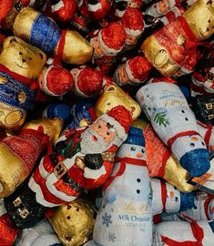 a pile of christmas ornaments sitting next to each other