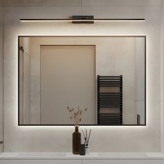 a bathroom with a sink, mirror and towel rack