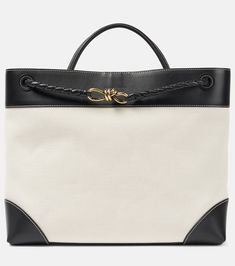 Andiamo Large leather-trimmed canvas tote bag in white - Bottega Veneta | Mytheresa Canvas Satchel With Gold-tone Hardware For Travel, Travel Canvas Satchel With Gold-tone Hardware, Elegant Canvas Bag With Gold-tone Hardware, Daily Use Canvas Satchel With Gold-tone Hardware, Luxury Canvas Tote Bag With Detachable Handle, Canvas Satchel With Gold-tone Hardware, Canvas Satchel Shoulder Bag With Gold-tone Hardware, Luxury Canvas Satchel With Handles, Canvas Tote Shoulder Bag With Handle Drop