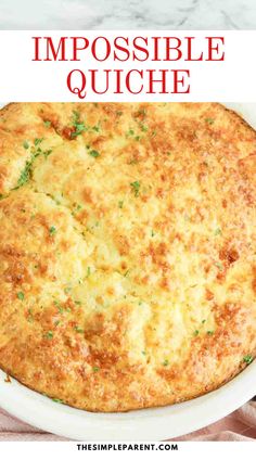 a casserole dish with cheese and parsley on top in a white bowl