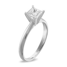 a white gold ring with a princess cut diamond