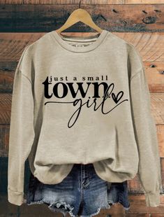 Add this Cute Small Town Girl   shirt to your wardrobe. This shirt will be your go to comfy favorite shirt. Guaranteed softness is what Ringspun softness provides. Our Small Town Long Sleeve   Tshirt comes in a variety of colors. If you want a different color, check our color chart and message us for a request. If you want the OVERSIZED LOOK like in the listing photos, please go up a size or two. ❤︎ SHIRT QUALITY  Soft Favorite  Tee   100% ring-spun cotton  Medium fabric  Relaxed fit  Soft washe Comical Quotes, Clothing Diys, Creative Vibes, Just A Small Town Girl, Shirt Quotes, Nana Shirts, Summer Tshirt, Tshirt Business