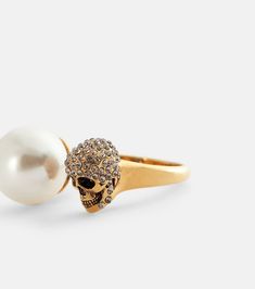 Find ALEXANDER MCQUEEN Skull Embellished Ring on Editorialist. Material: brass. Made in Italy. Pendant: faux pearl. Designer color name: Mix. Alexander Mcqueen Skull, Skull Jewelry, Color Names, Faux Pearl, Alexander Mcqueen, Gold Rings, Color Design, Alexander, Dust Bag