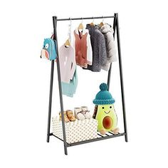 Return Policy Fast Delivery Trusted seller Kids Clothing Rack, 46'' Steel Kids Garment Rack with Storage Shelf, Steel Costumes Clothes Hanging Rack, Small Clothes Rack with Hooks, Black Product Description 【2-in-1 Design with Large Storage Space】The closet is separated into two spaces. The hanging bar is about 46“ in height and tall enough for kid's dresses and long clothes. The bottom shelf has enough space to let kids put their shoes and toys on it. 2-in-1 Design gives this dress up rack large storage capacity. 【Convenient Hanging Hook & Side Hooks】The clothes hanging rack is built with hooks on both sides to hang hats, bags and other accessories. Besides, it also comes with an additional hanging hook which can be hanged horizontally and vertically to hold towels, scarves and other items Shelf And Hooks, Clothes Hanging Rack, Hang Hats, Kids Clothing Rack, Clothes Shelves, Free Standing Closet, Hanging Hats, Kids Garments, Clothes Hanging