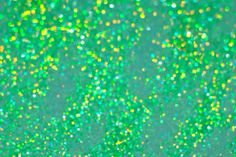 green and yellow speckles are scattered on the ground in this image, with only one object visible