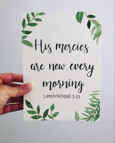 someone holding up a piece of paper that says, his mercies are new every morning