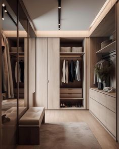 an empty walk in closet with clothes and shoes