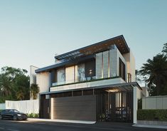 a car is parked in front of a modern house