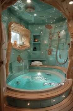 a bathroom with a large jacuzzi tub in the center and lights on the ceiling