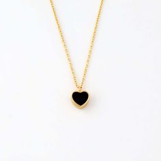 Presenting the Black Heart Necklace in 14K Solid Gold, an ideal birthday gift for women. This dainty heart necklace, crafted in 14k yellow gold, radiates luxury and elegance. With its unique heart design, this stylish necklace adds a touch of sophistication to any outfit, making it a must-have in your jewelry collection. Perfect for everyday wear or special occasions, it's not just a piece of jewelry, it's a symbol of love and affection. 14K solid gold handcrafted pieces 100% ethical sourced jew Black Heart Necklace, Dainty Heart Necklace, 14k Yellow Gold Necklace, Birthday Gift For Women, Stylish Necklace, Heart Chain, Gold Heart Necklace, Outfit Making, Black Heart