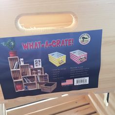 an advertisement for what - a - crate on the back of a wooden chair in a store