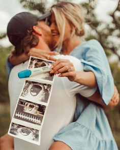 a man and woman kissing each other while holding an x - ray