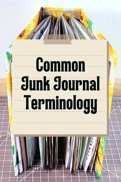 a pile of papers with the words common junk journal terminology on top of it